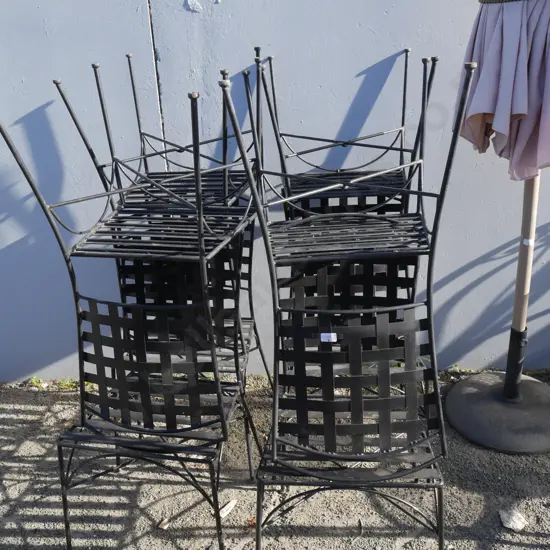 8 black metal chairs