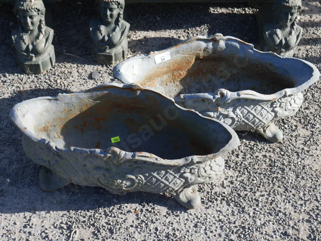Pair of cast iron planters Image 1++