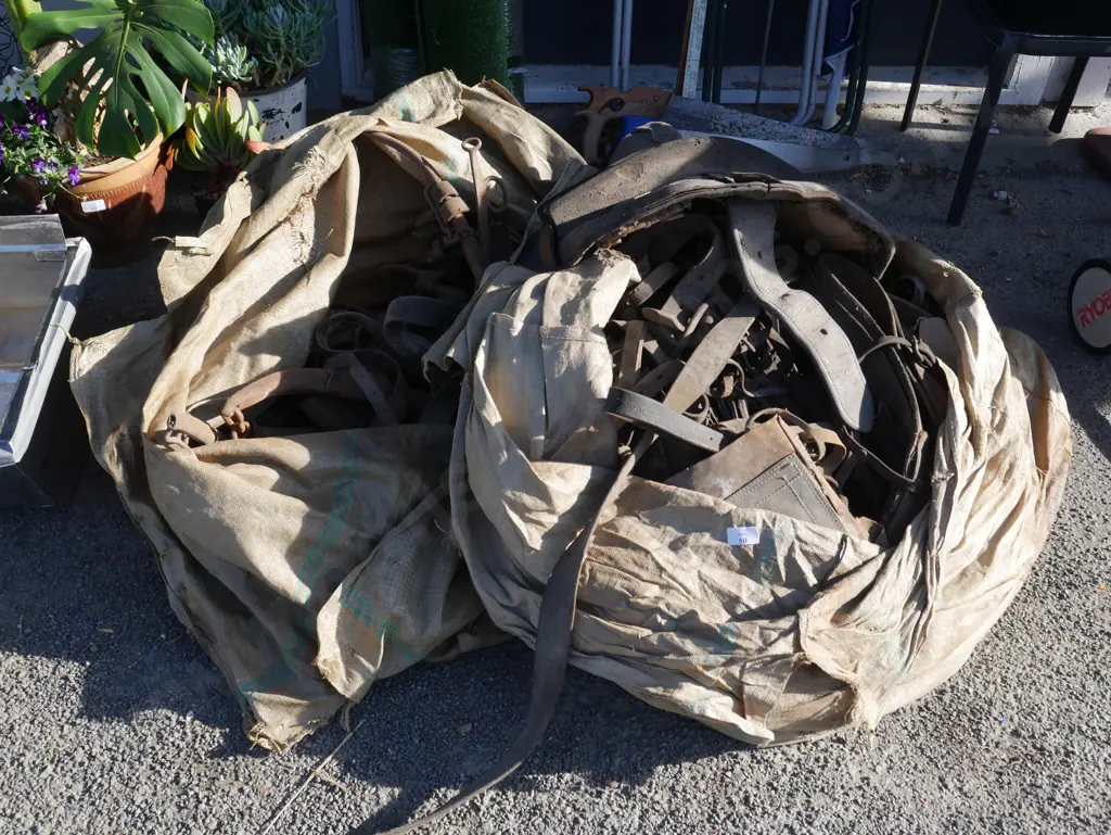 2 sacks of saddles, horse gear Image 1++