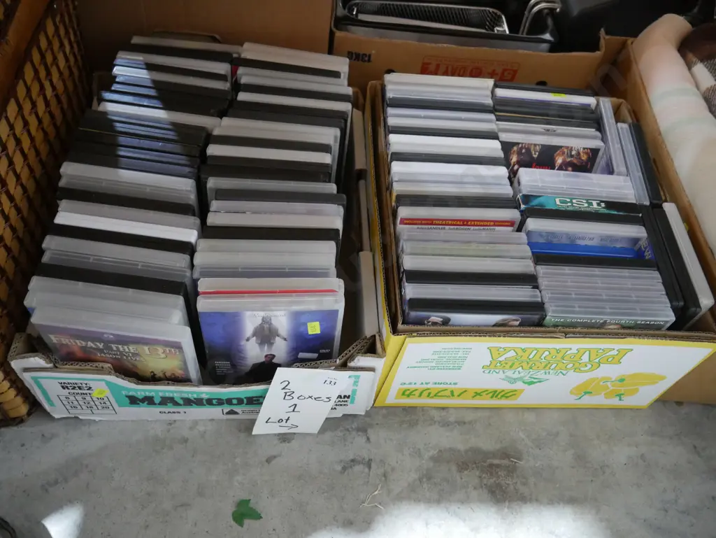 Two boxes of DVDs Image 1++