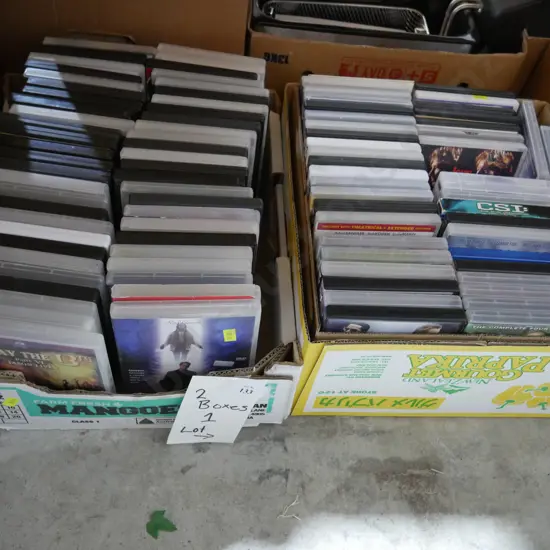 Two boxes of DVDs
