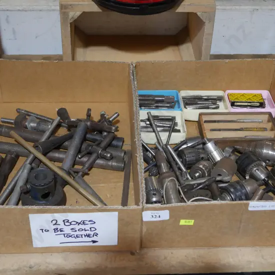 Two boxes of drill parts etc