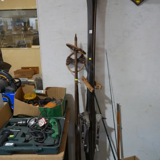 Vintage wooden skis and poles