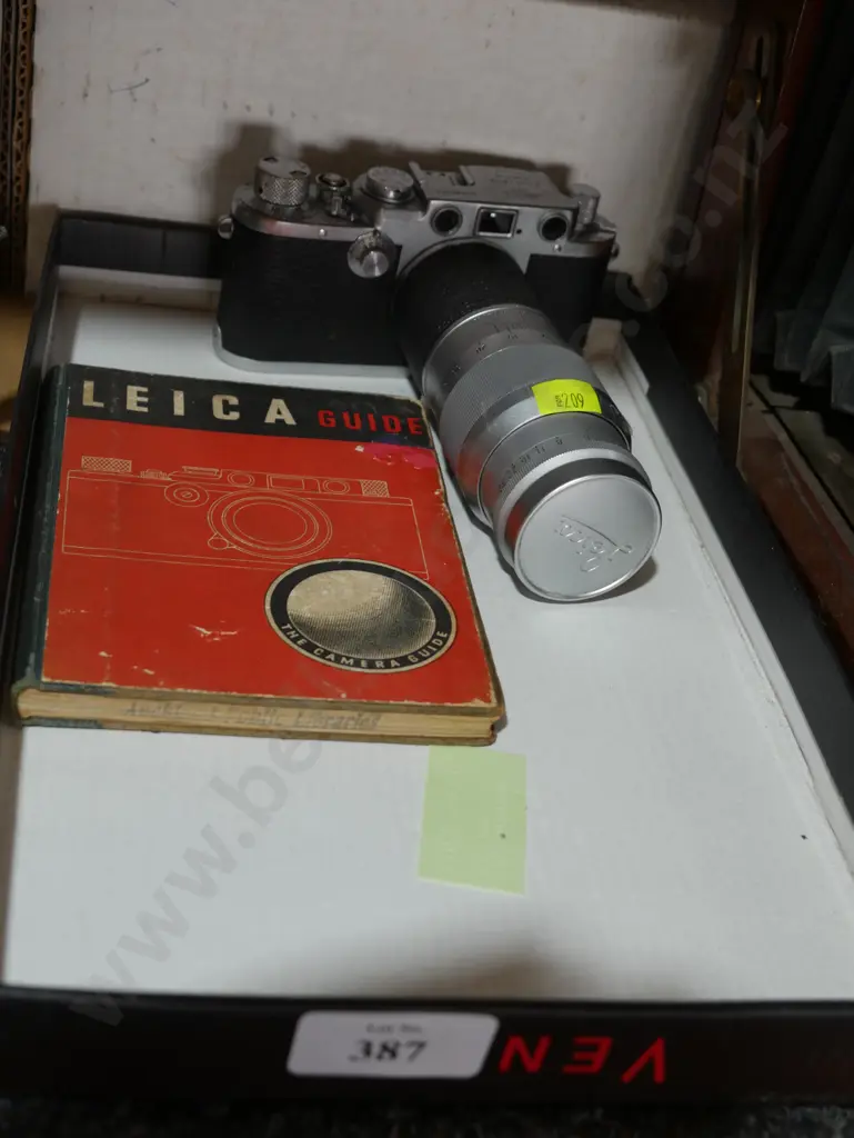Leica camera and book Image 1++
