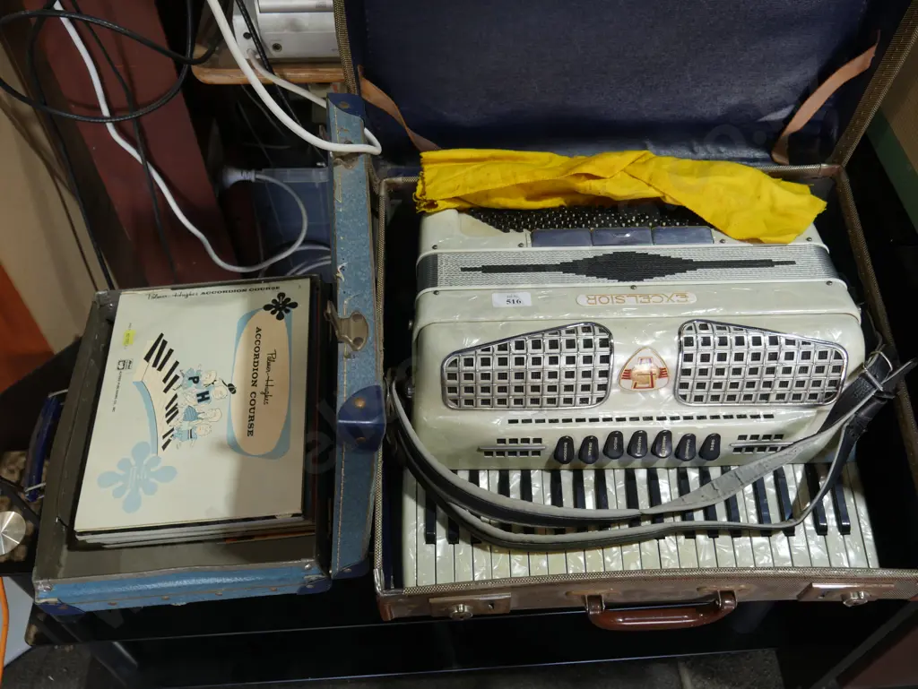 Piano accordion and music books Image 1++