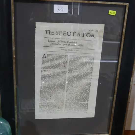 Framed newspaper cutout