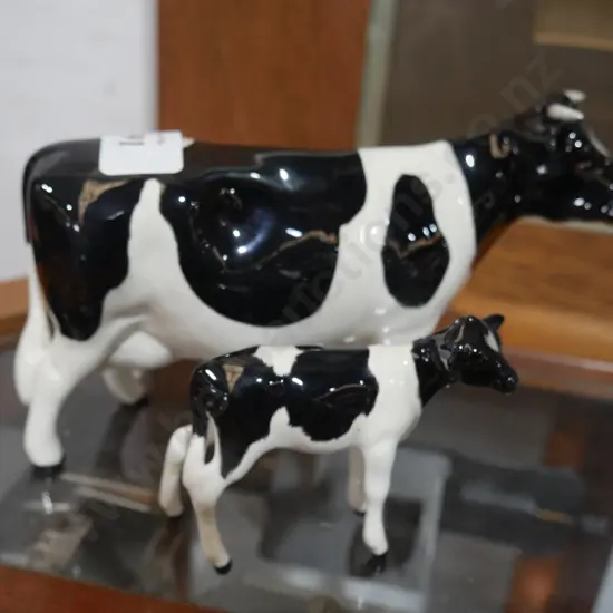 Beswick cow and calf (calf repaired)