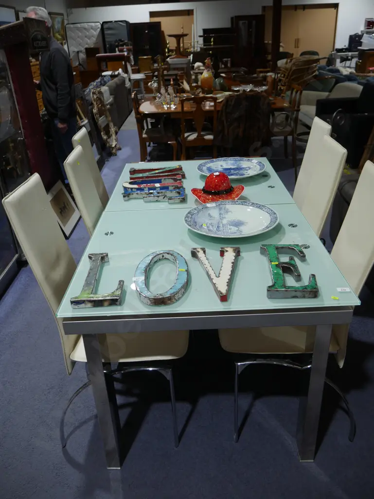 Glass top extension dining table and six chairs Image 1++