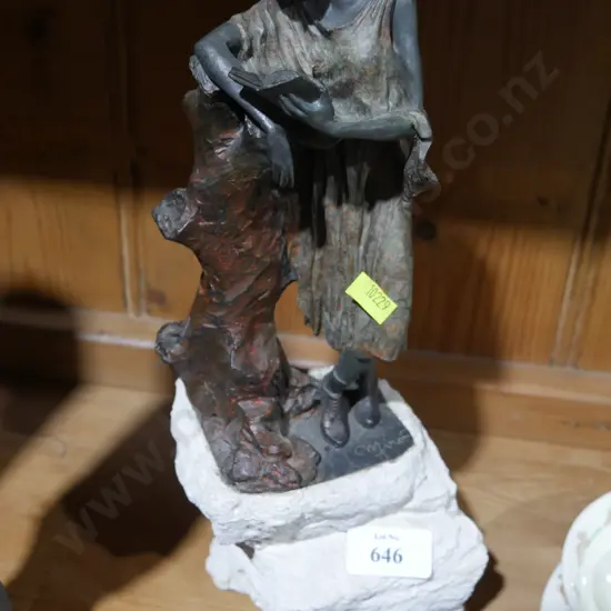 Signed metal sculpture