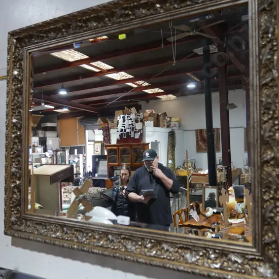 Carved framed mirror