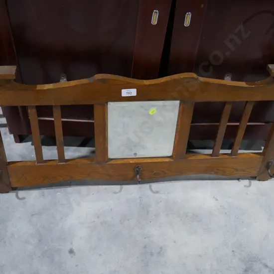 Wall mirror with coat hooks