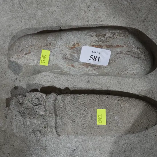 Concrete maori carvings