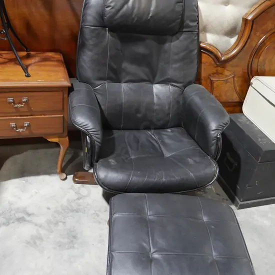 Black armchair and stool