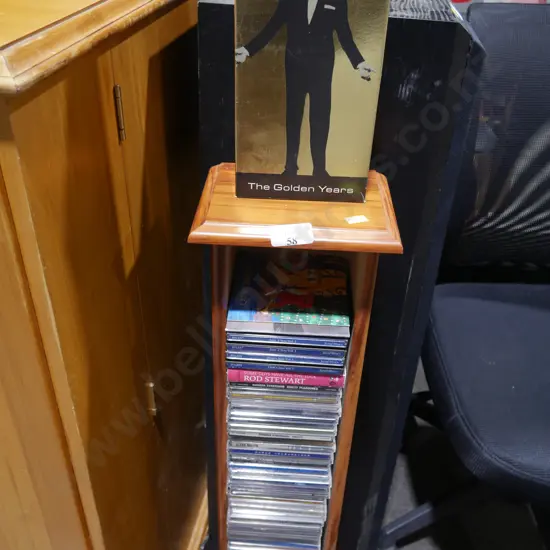 Assorted CDs and stand
