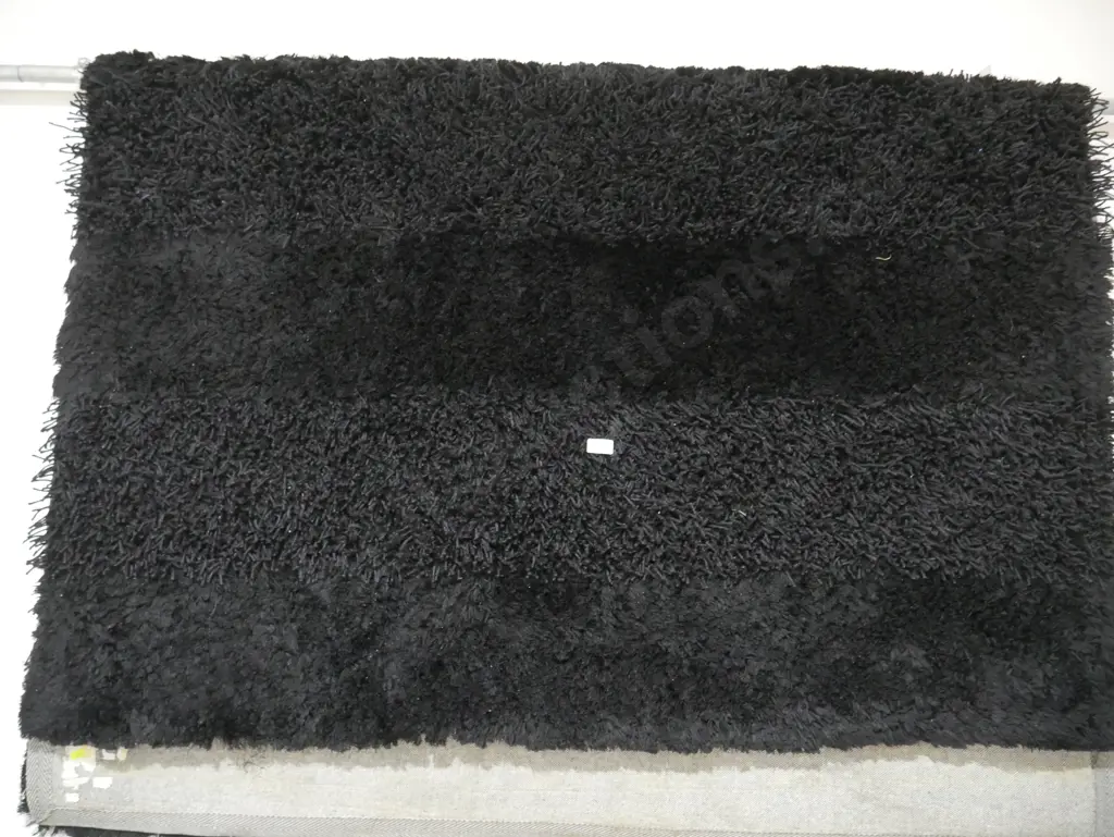 Black shaggy floor rug Image 1++
