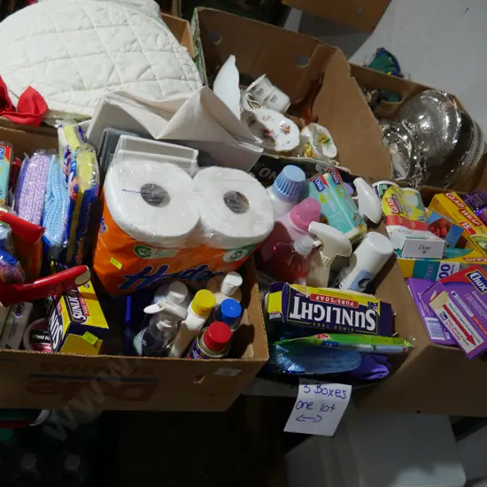 Three boxes of cleaning items