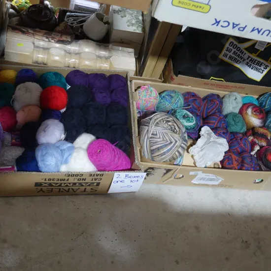 2 boxes balls of wool