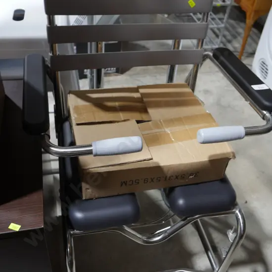 New invalid toilet/shower chair