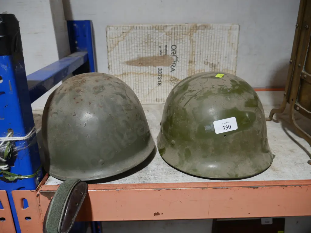 2 military helmets Image 1++