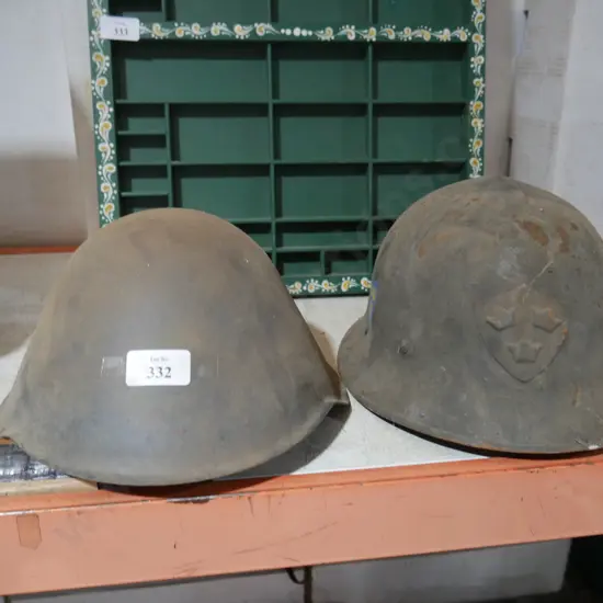 Two military helmets