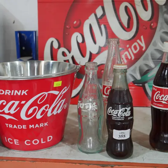 Coca-Cola bottles and bucket