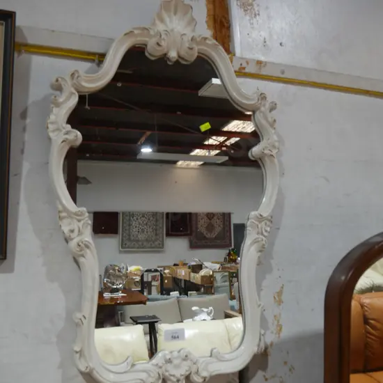 Ornate framed mirror
