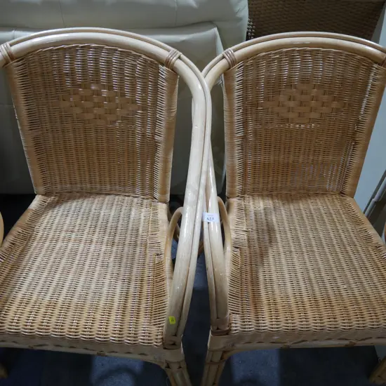 2 cane chairs