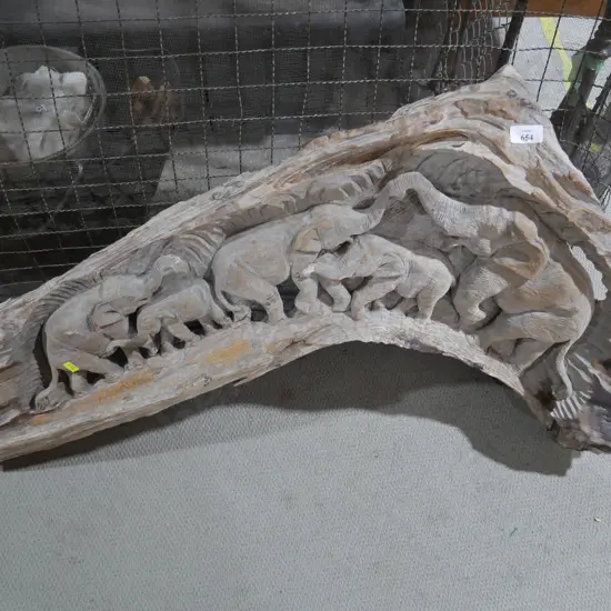 Wood carving of elephants