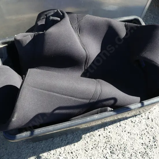Box with wetsuit