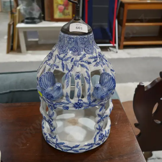 Blue and white bird feeder