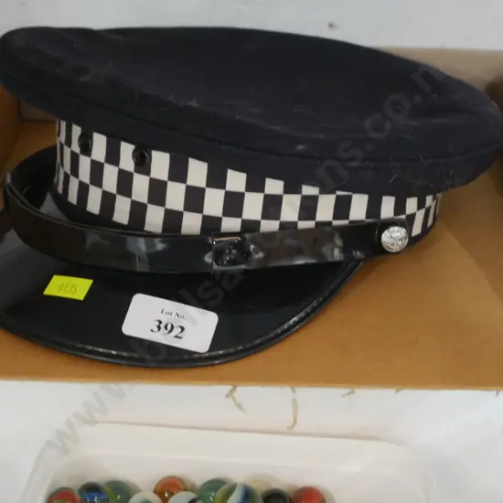 Police cap and baton