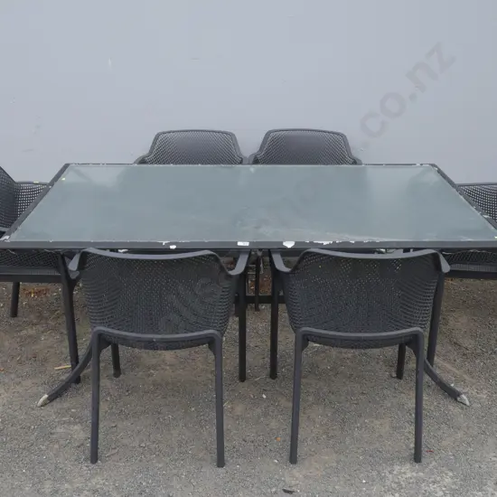 Glass top outdoor table and 6 chairs