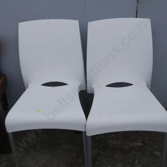 2 white chairs