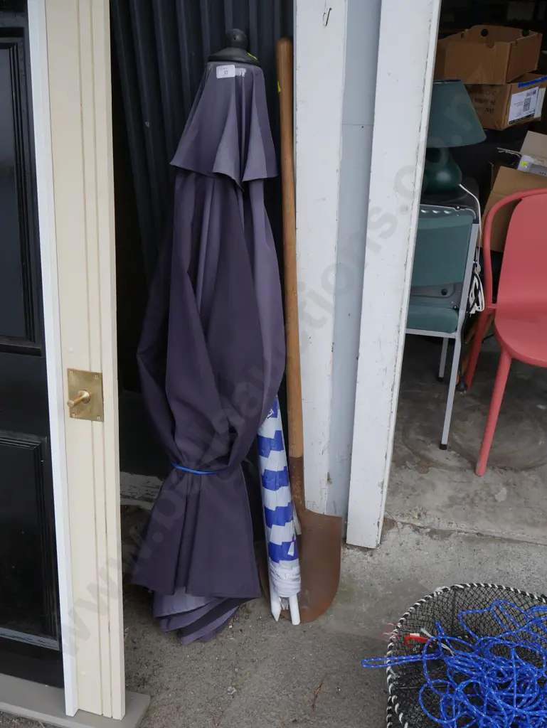 Umbrellas and shovel Image 1++
