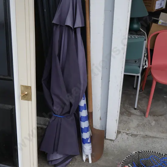 Umbrellas and shovel
