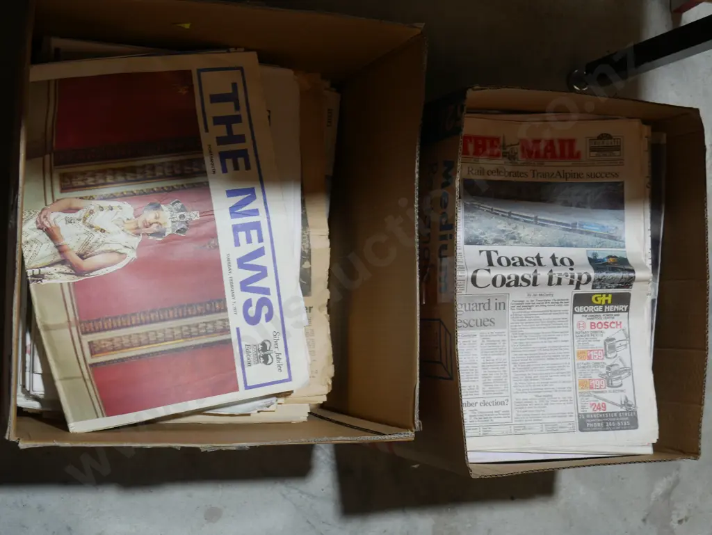 2 boxes of newspapers Image 1++