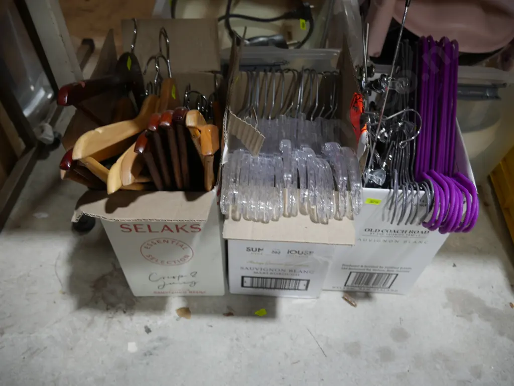 Three boxes of coat hangers Image 1++
