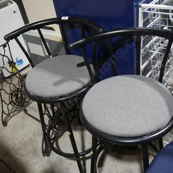 2 swivel top bar stools