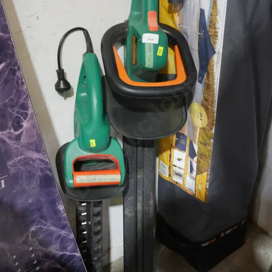 2 Black and Decker hedge trimmers