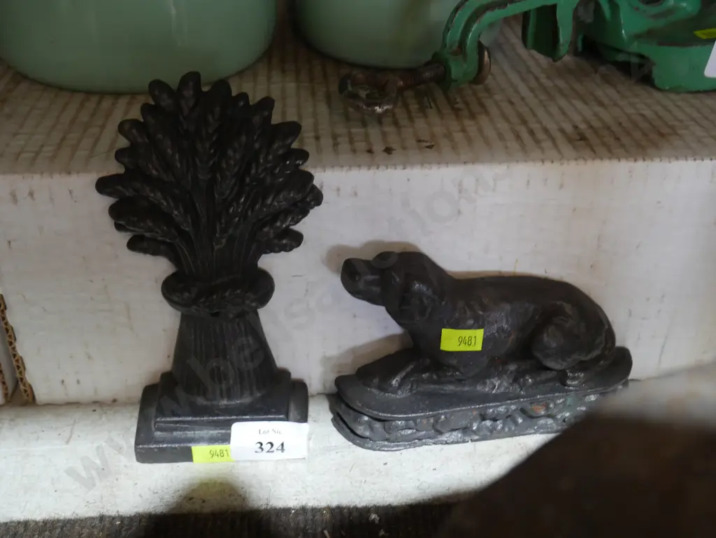 Two cast door stops Image 1++