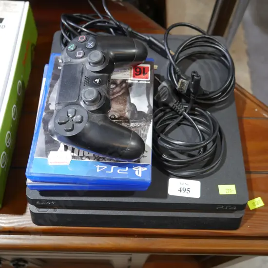 PS4 with games and controller