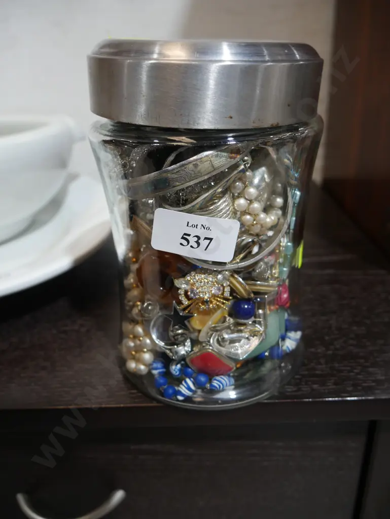 Glass jar of costume jewellery Image 1++