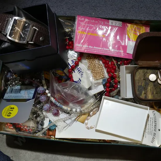 Large tin of costume jewellery