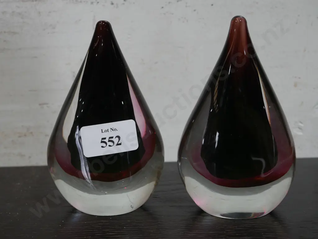 A pear of glass paperweights Image 1++