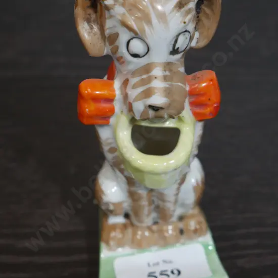 Ceramic dog toothbrush holder