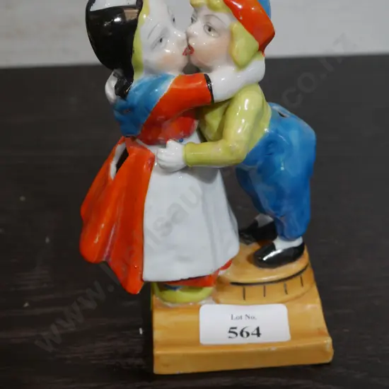 Kissing couple ceramic toothbrush holder
