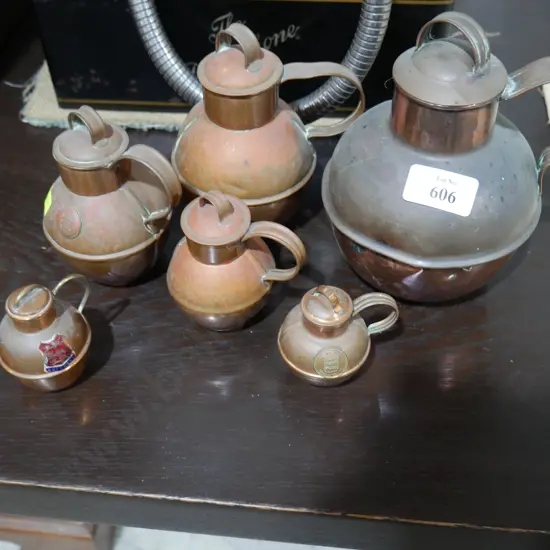 6 small copper milk cans