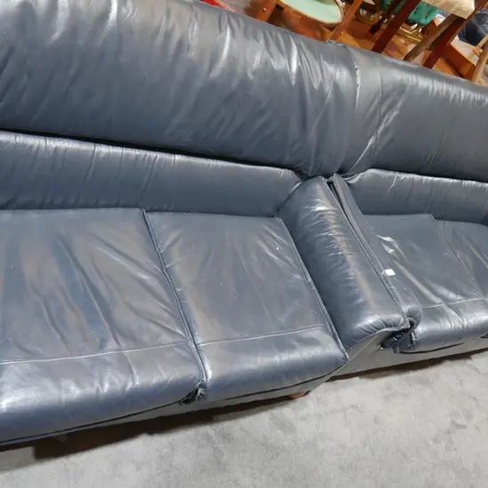 Two blue leather two person  sofas