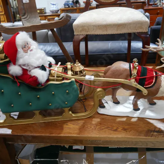 Plug in moving santa & reindeer decoration