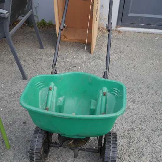 Walk behind spreader